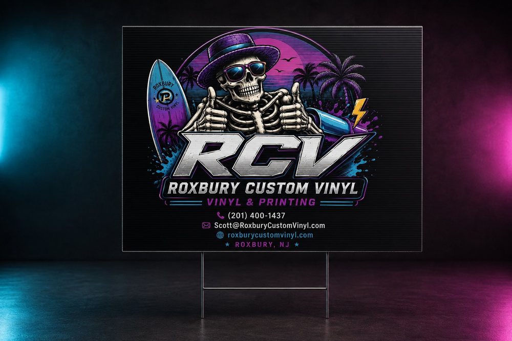 Roxbury Custom Vinyl skeleton business yard sign with contact information.